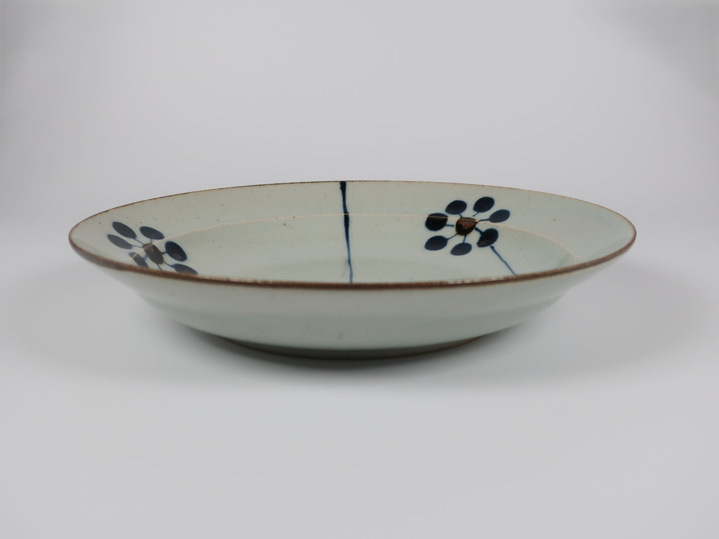 Hasami ware flat plate, hand-painted blue fruit design, 7-inch plate