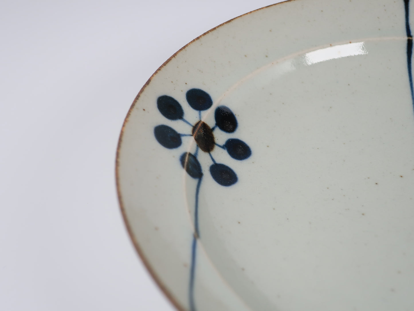 Hasami ware flat plate, hand-painted blue fruit design, 7-inch plate