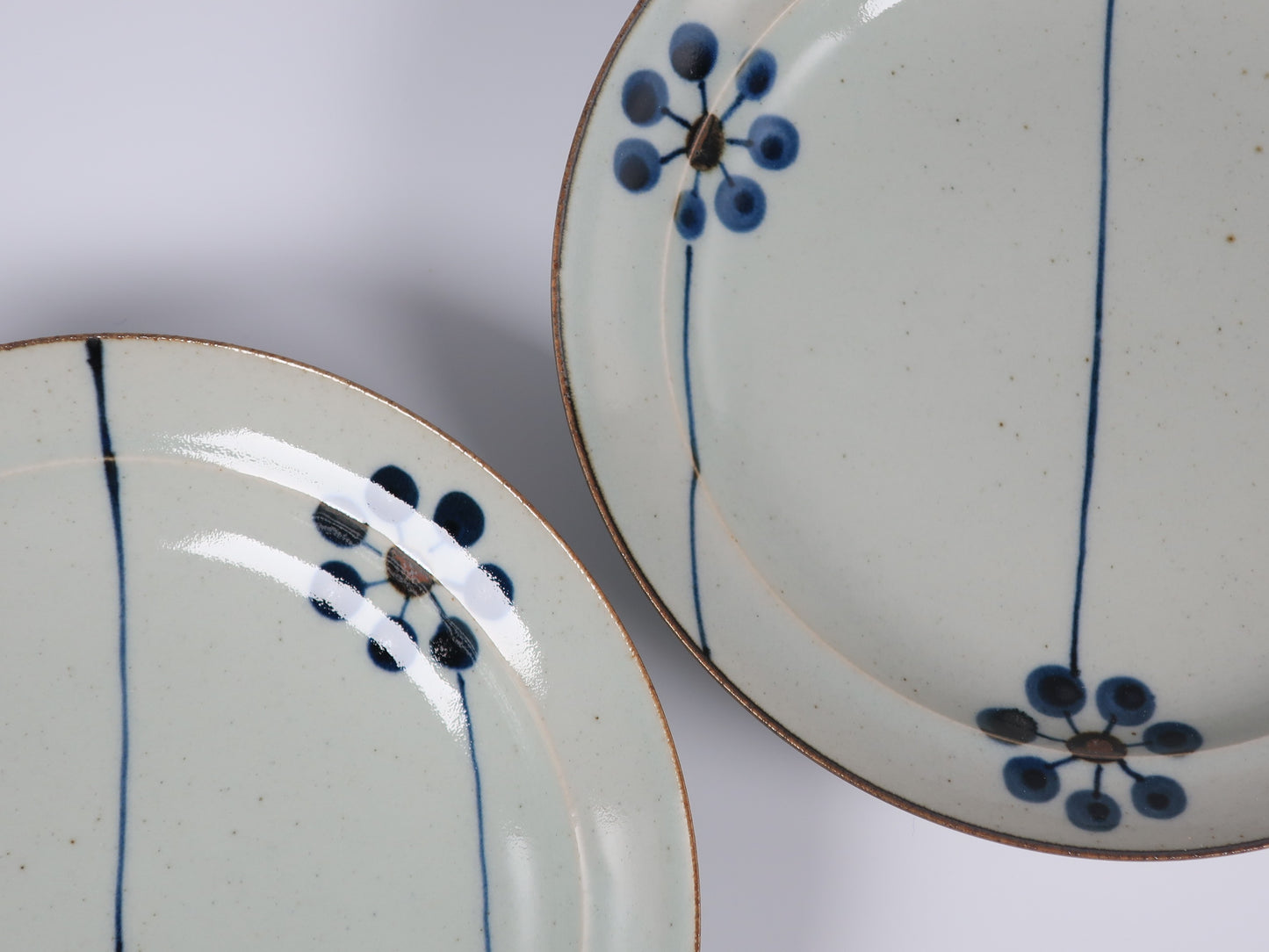 Hasami ware flat plate, hand-painted blue fruit design, 7-inch plate