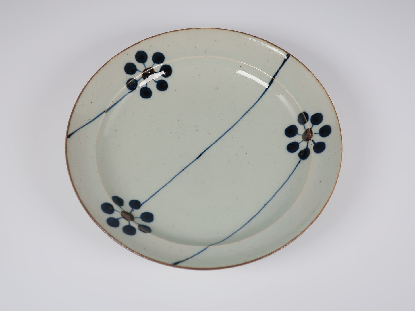 Hasami ware flat plate, hand-painted blue fruit design, 7-inch plate