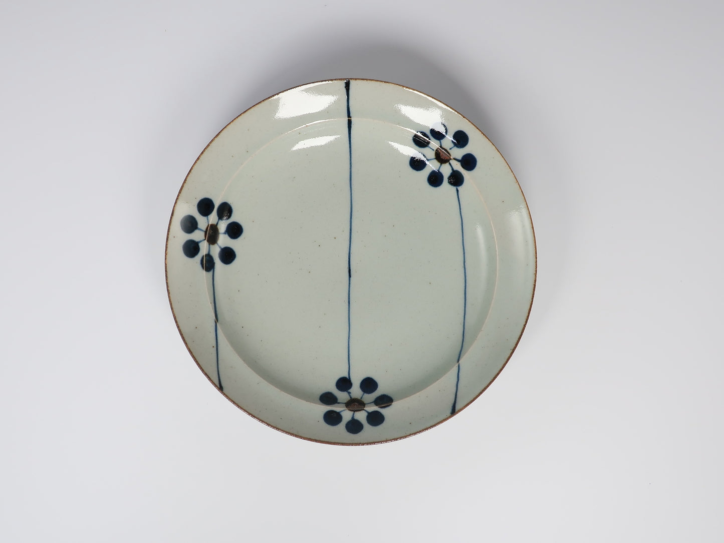 Hasami ware flat plate, hand-painted blue fruit design, 7-inch plate